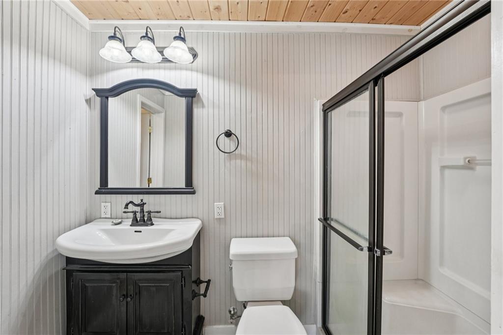 257 Shellhorse Road Southeast Ranger, GA 30734 - Photo 18 of 44 a bathroom with a sink a toilet and shower