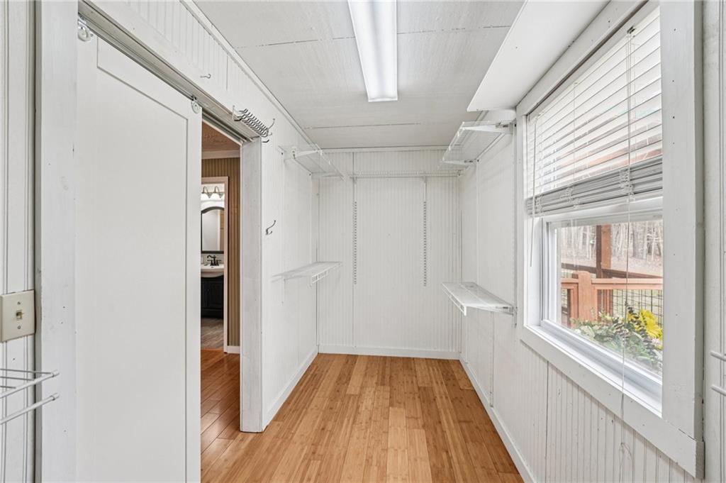 257 Shellhorse Road Southeast Ranger, GA 30734 - Photo 19 of 44 a view of a hallway with wooden floor and staircase