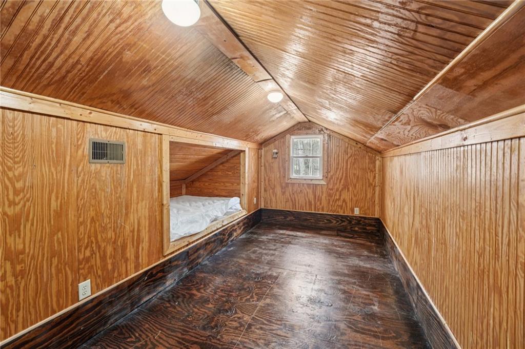 257 Shellhorse Road Southeast Ranger, GA 30734 - Photo 26 of 44 a view of a room with wooden floor and windows