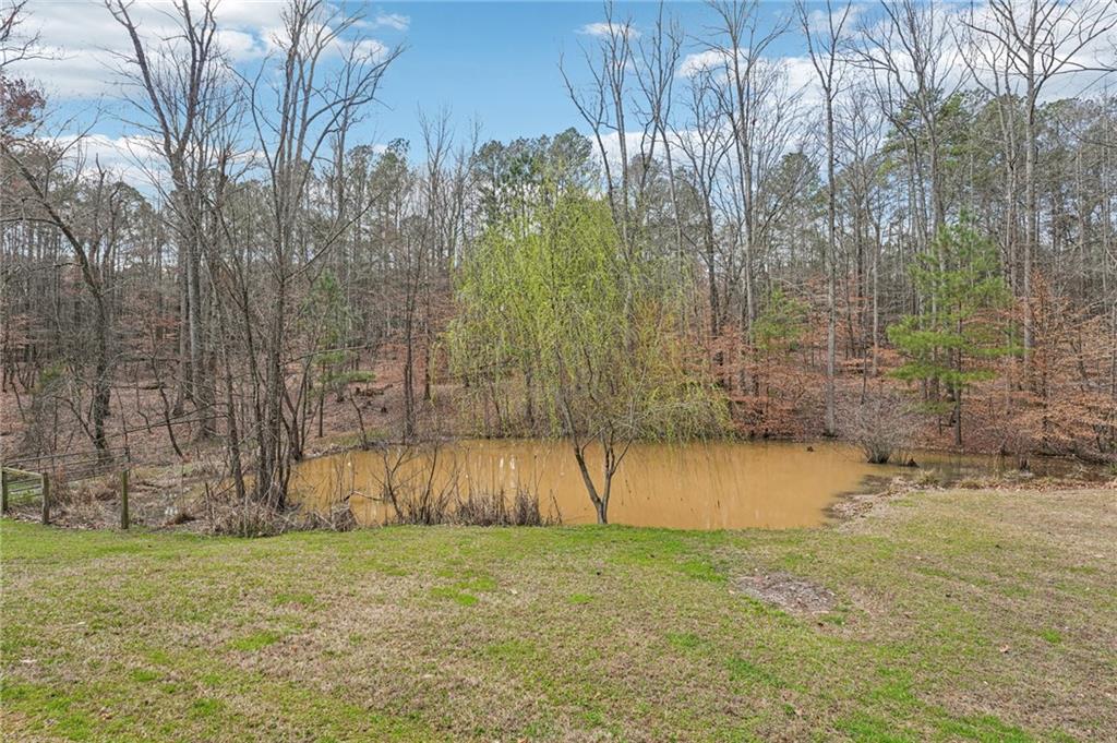 257 Shellhorse Road Southeast Ranger, GA 30734 - Photo 32 of 44 a view of a yard with wooden fence