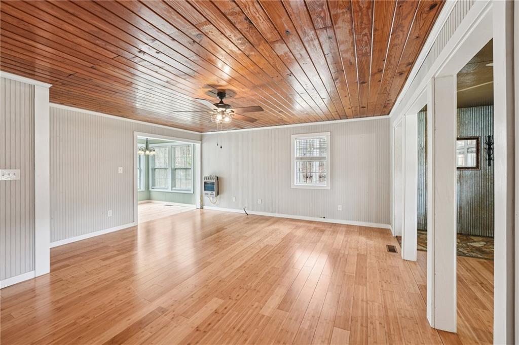 257 Shellhorse Road Southeast Ranger, GA 30734 - Photo 7 of 44 a view of an empty room with wooden floor and a window