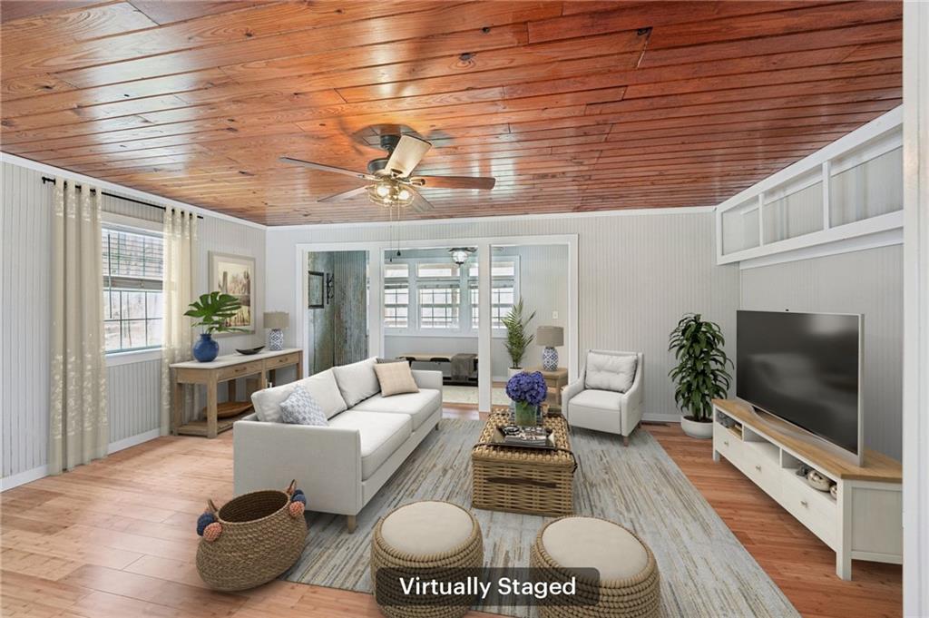 257 Shellhorse Road Southeast Ranger, GA 30734 - Photo 8 of 44 a living room with furniture and a flat screen tv