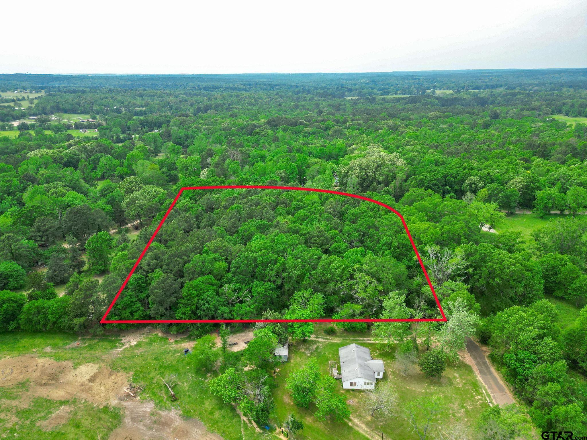 Tbd Giraffe Road Gilmer, TX 75644 - Photo 4 of 10 a view of an outdoor space and a yard