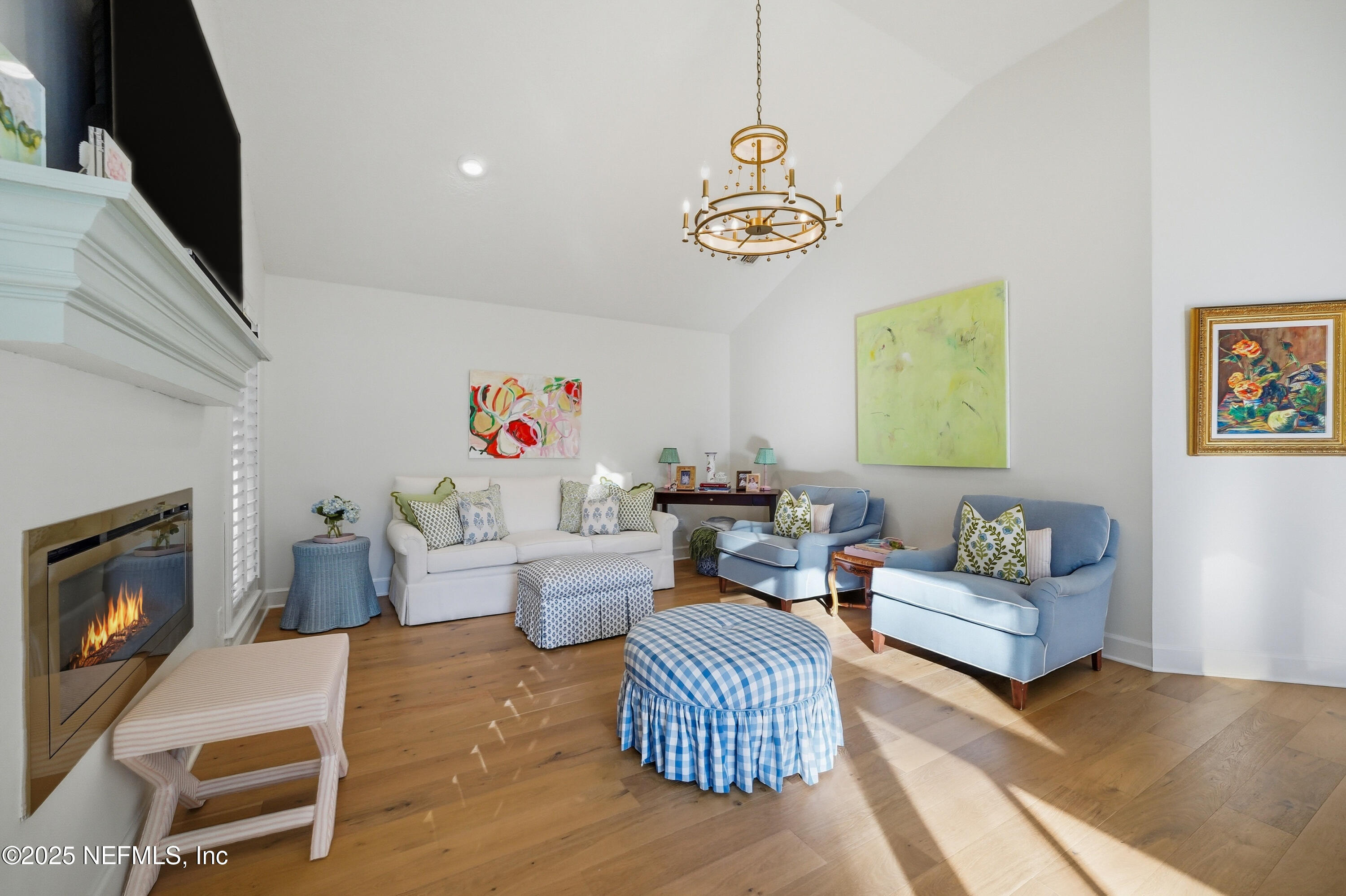 1202 Salt Creek Pointe Way Ponte Vedra Beach, FL 32082 - Photo 12 of 77 a living room with furniture and a flat screen tv