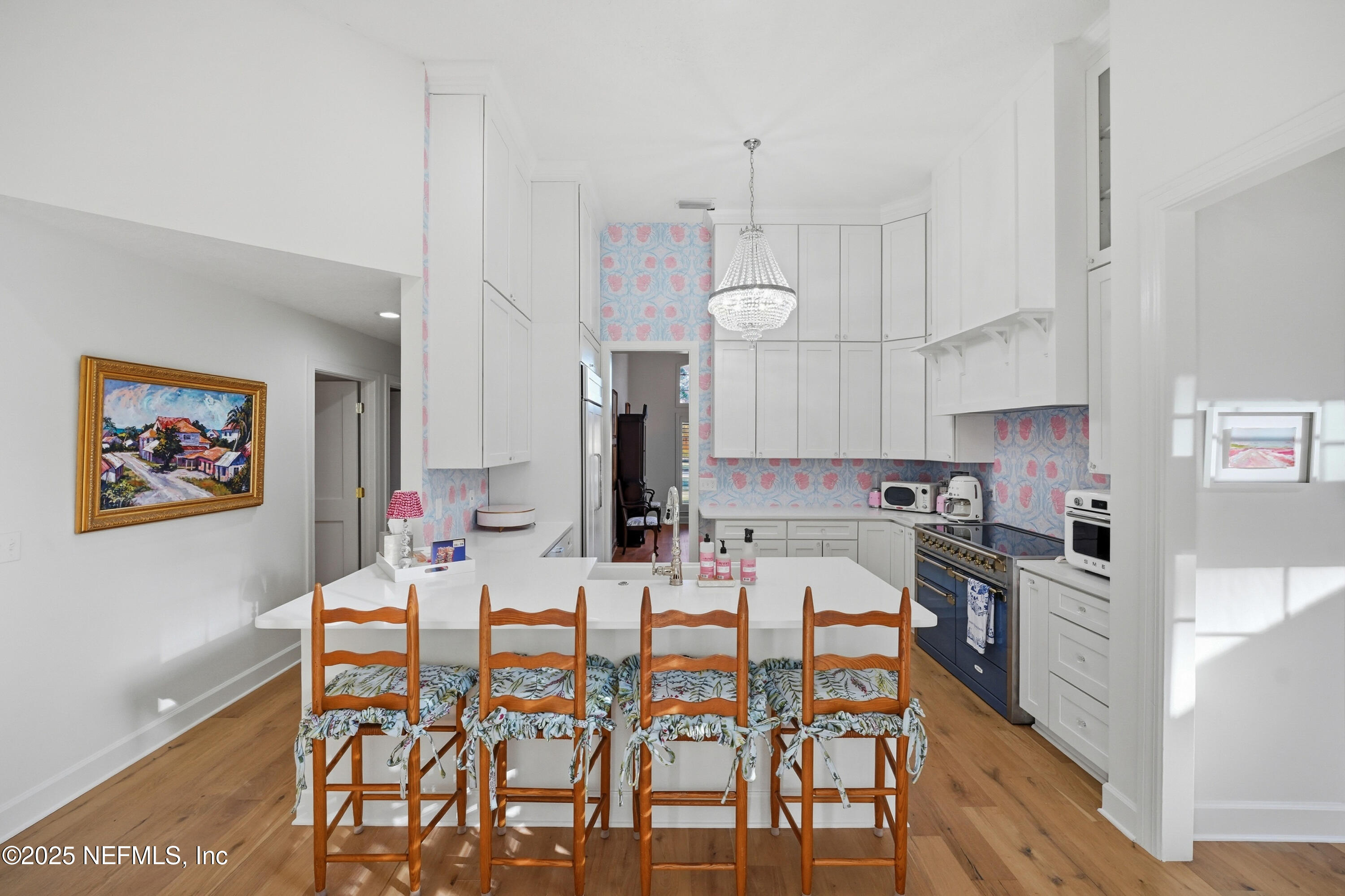 1202 Salt Creek Pointe Way Ponte Vedra Beach, FL 32082 - Photo 16 of 77 a large kitchen with a table and chairs