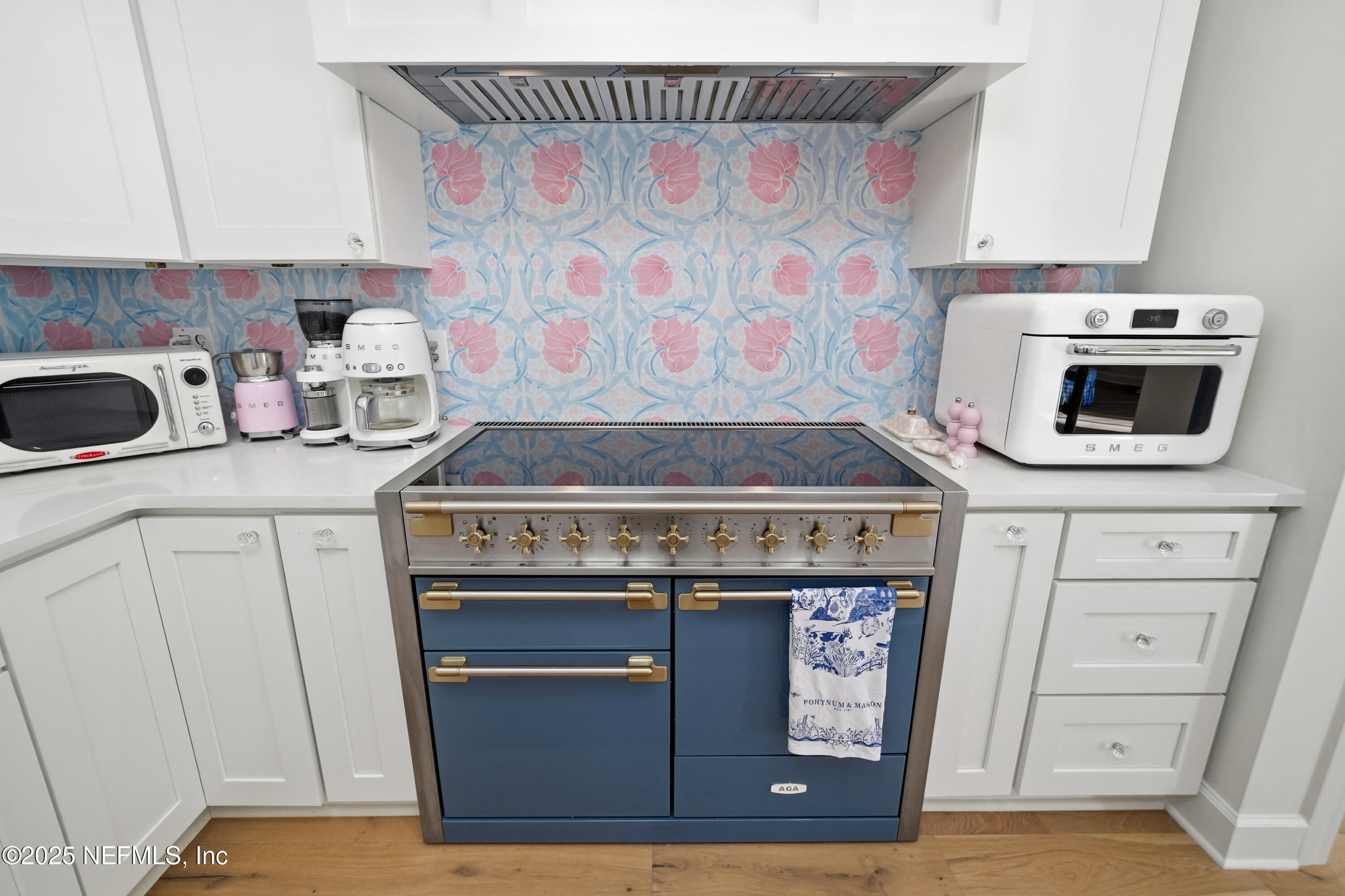 1202 Salt Creek Pointe Way Ponte Vedra Beach, FL 32082 - Photo 18 of 77 a stove top oven sitting inside of a kitchen