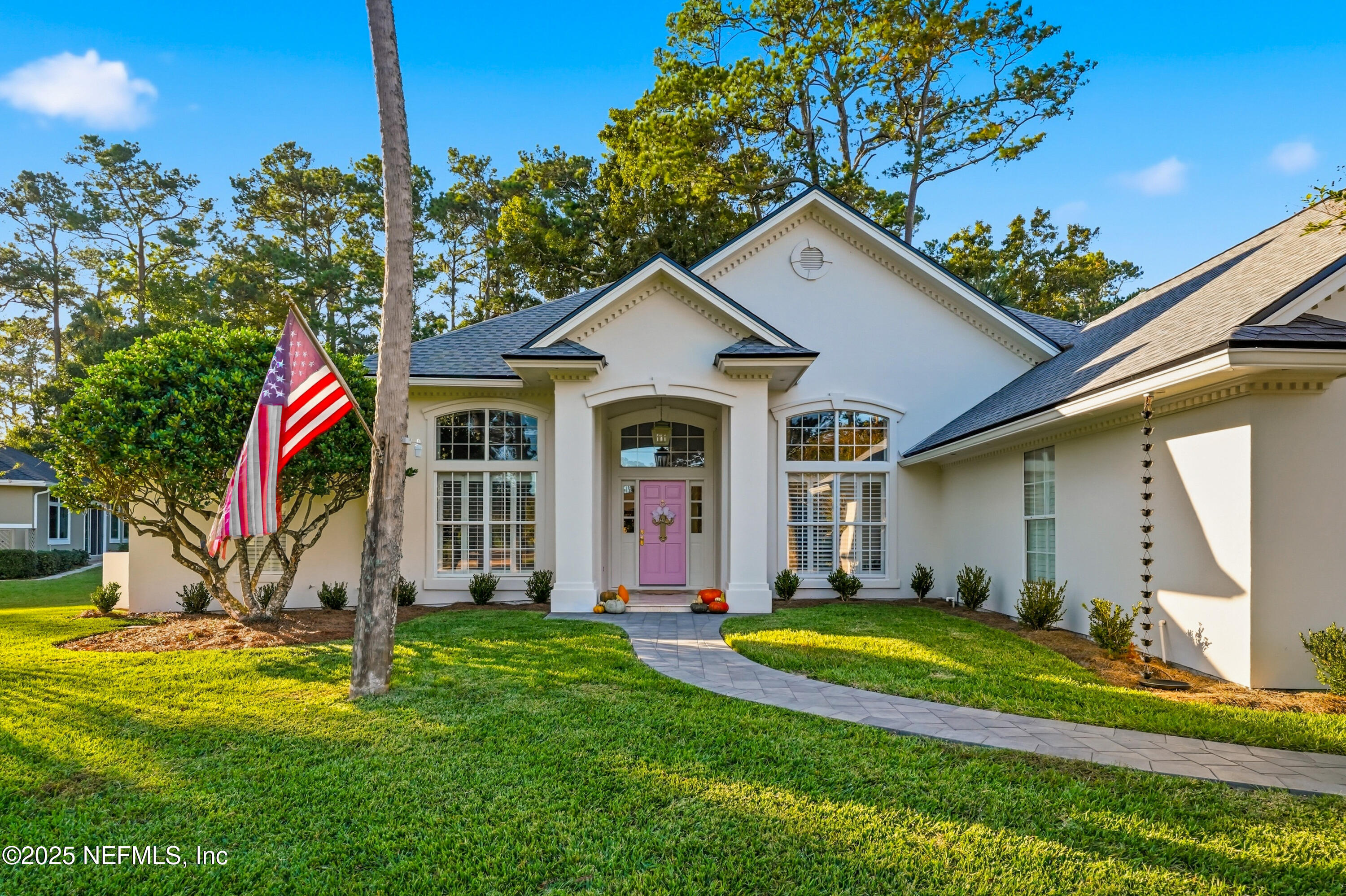 1202 Salt Creek Pointe Way Ponte Vedra Beach, FL 32082 - Photo 2 of 77 a view of a house with swimming pool and a yard