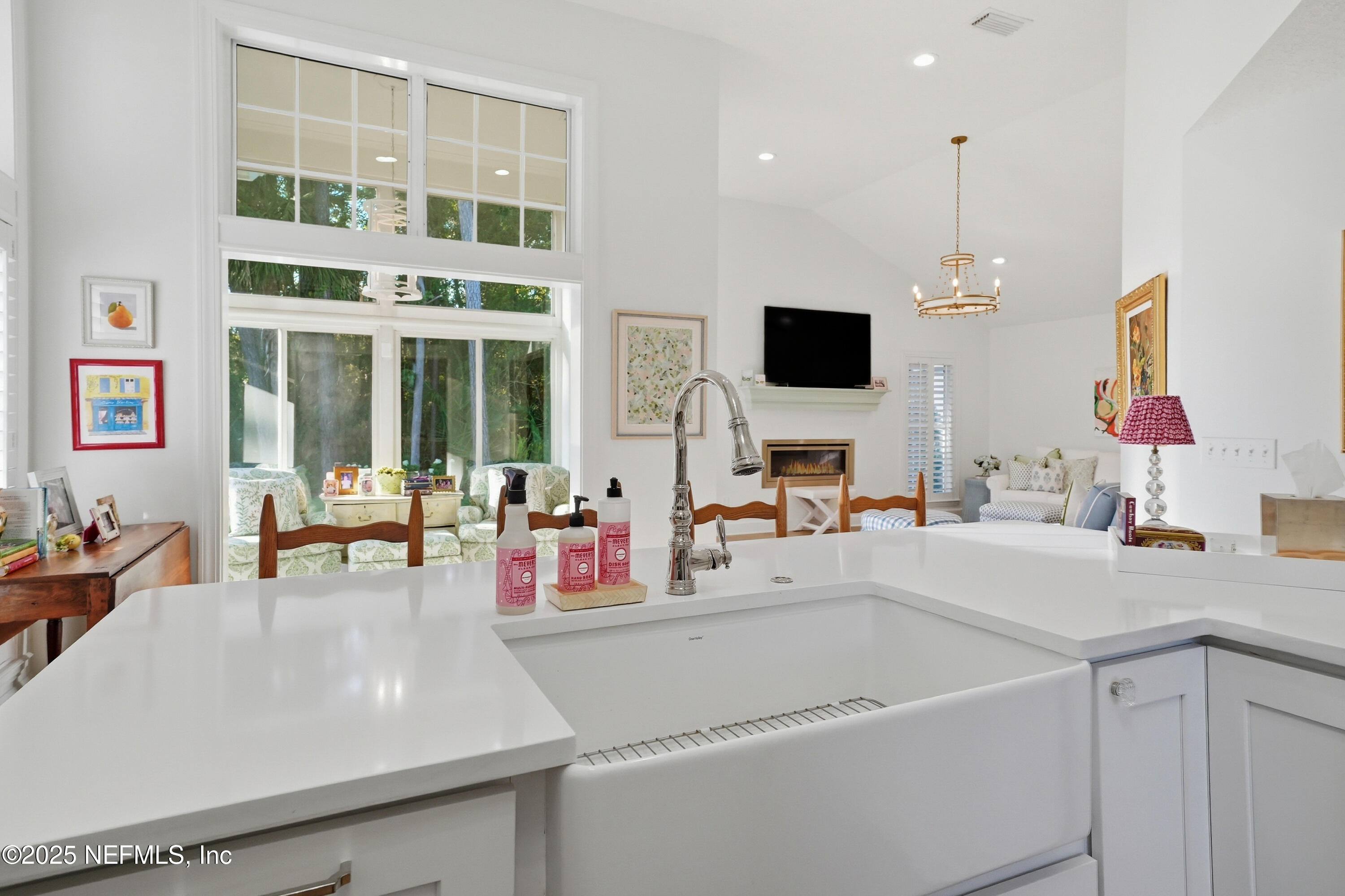1202 Salt Creek Pointe Way Ponte Vedra Beach, FL 32082 - Photo 21 of 77 a living room with furniture and flat screen tv