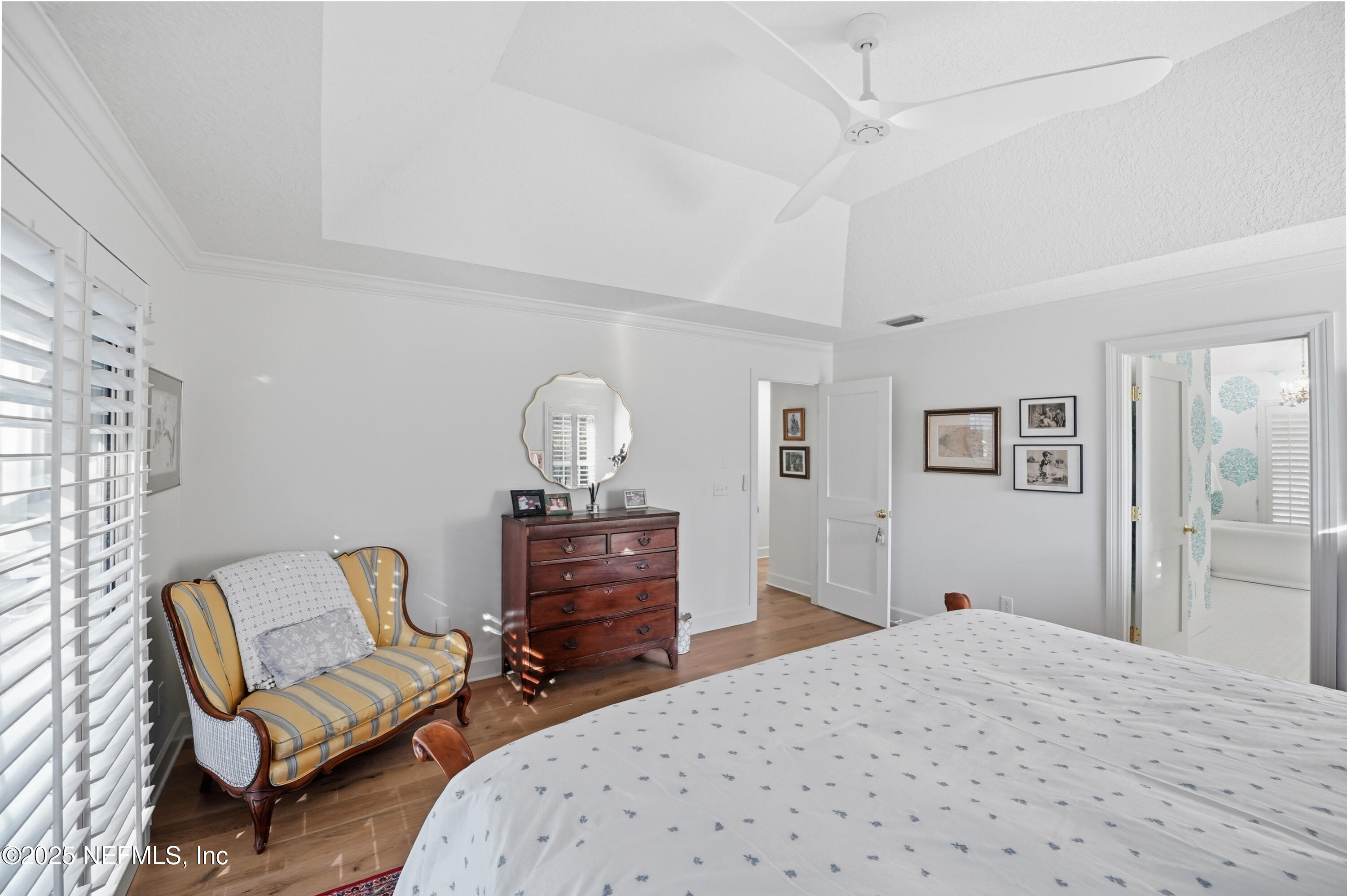 1202 Salt Creek Pointe Way Ponte Vedra Beach, FL 32082 - Photo 25 of 77 a bedroom with furniture and wooden floor