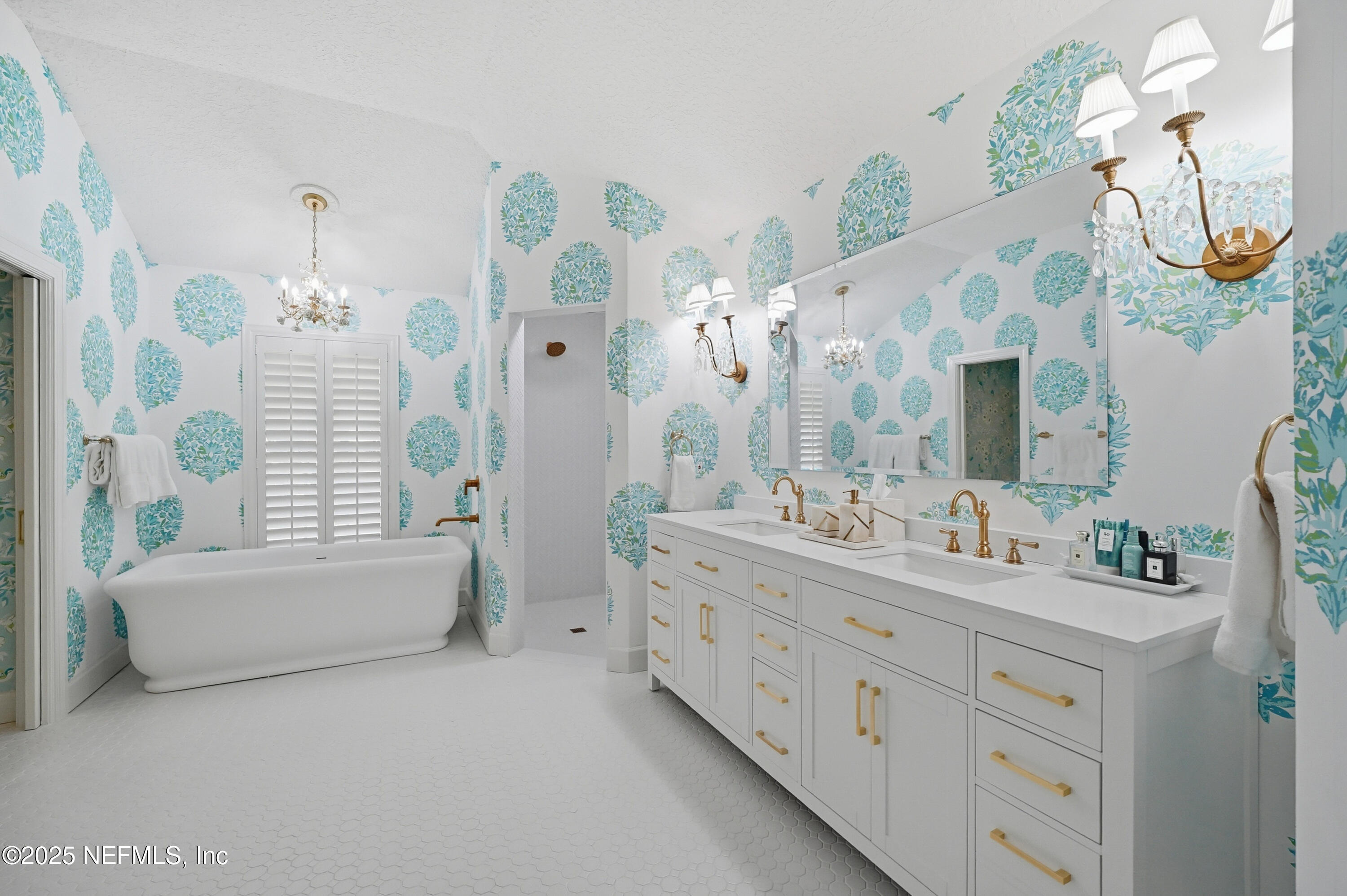 1202 Salt Creek Pointe Way Ponte Vedra Beach, FL 32082 - Photo 26 of 77 a bathroom with a double vanity sink mirror and bathtub