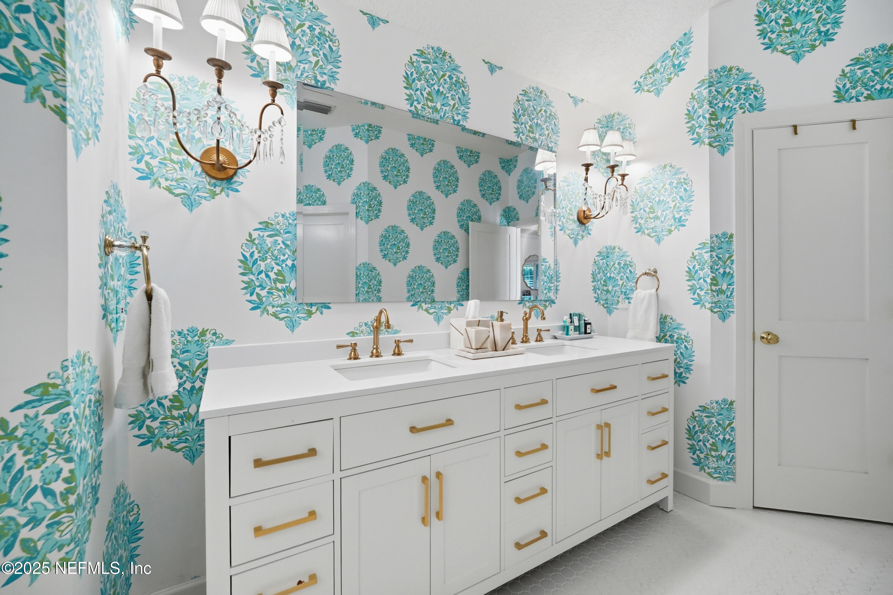 1202 Salt Creek Pointe Way Ponte Vedra Beach, FL 32082 - Photo 27 of 77 a bathroom with a granite countertop sink a mirror a vanity and a shower