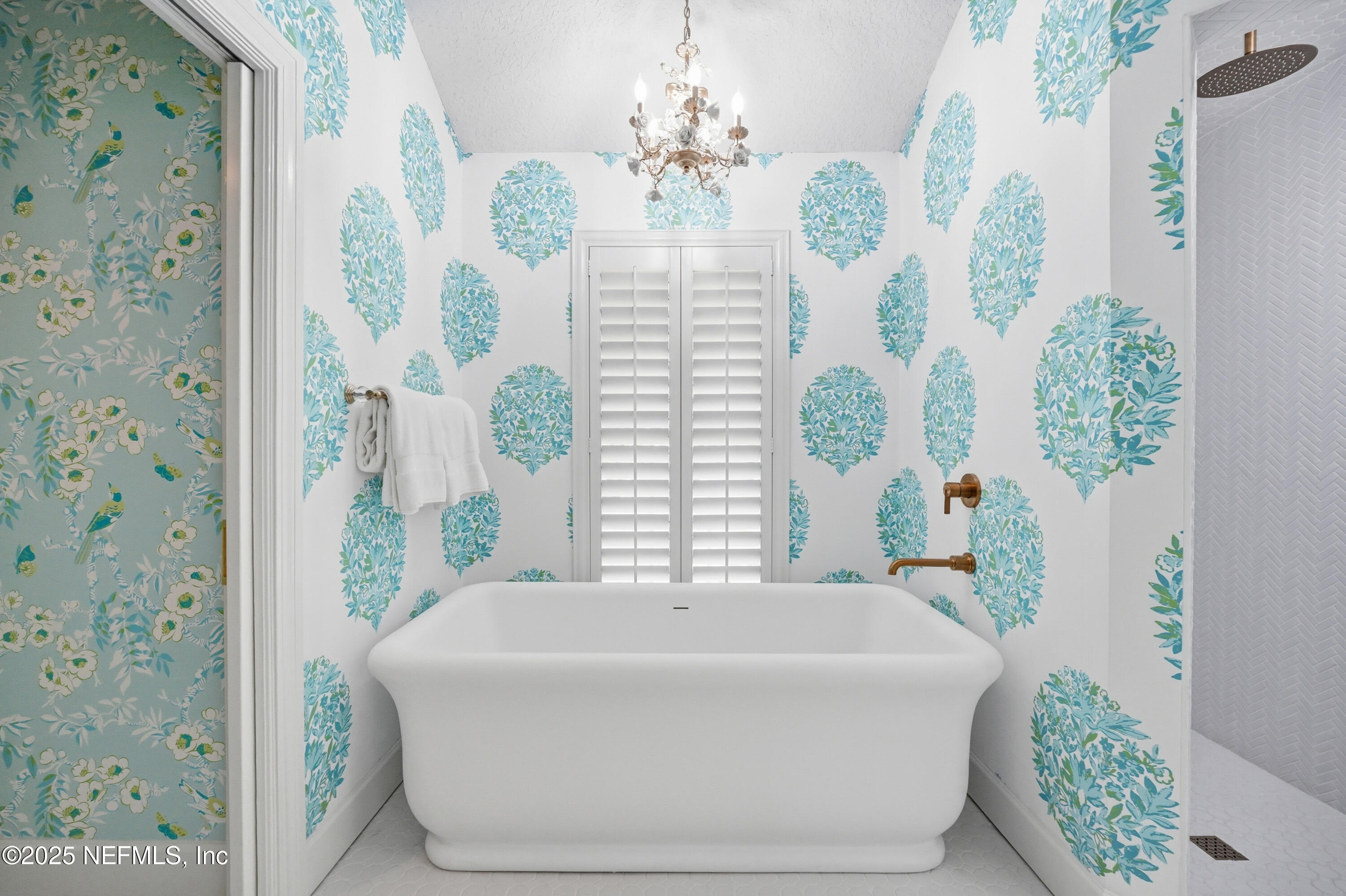 1202 Salt Creek Pointe Way Ponte Vedra Beach, FL 32082 - Photo 28 of 77 a spacious bathroom with a bathtub and potted plant