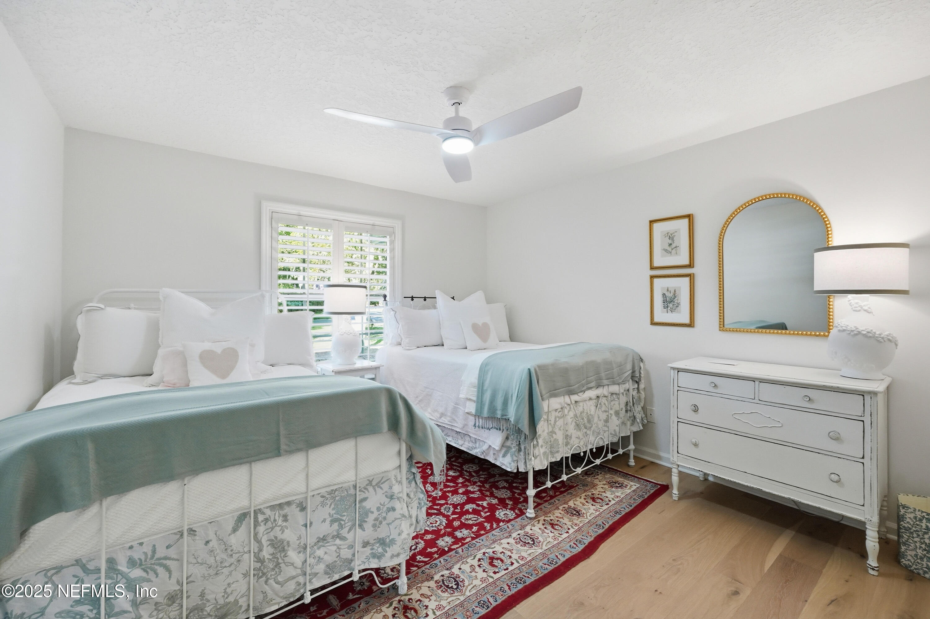 1202 Salt Creek Pointe Way Ponte Vedra Beach, FL 32082 - Photo 30 of 77 a bedroom with a bed and a dresser