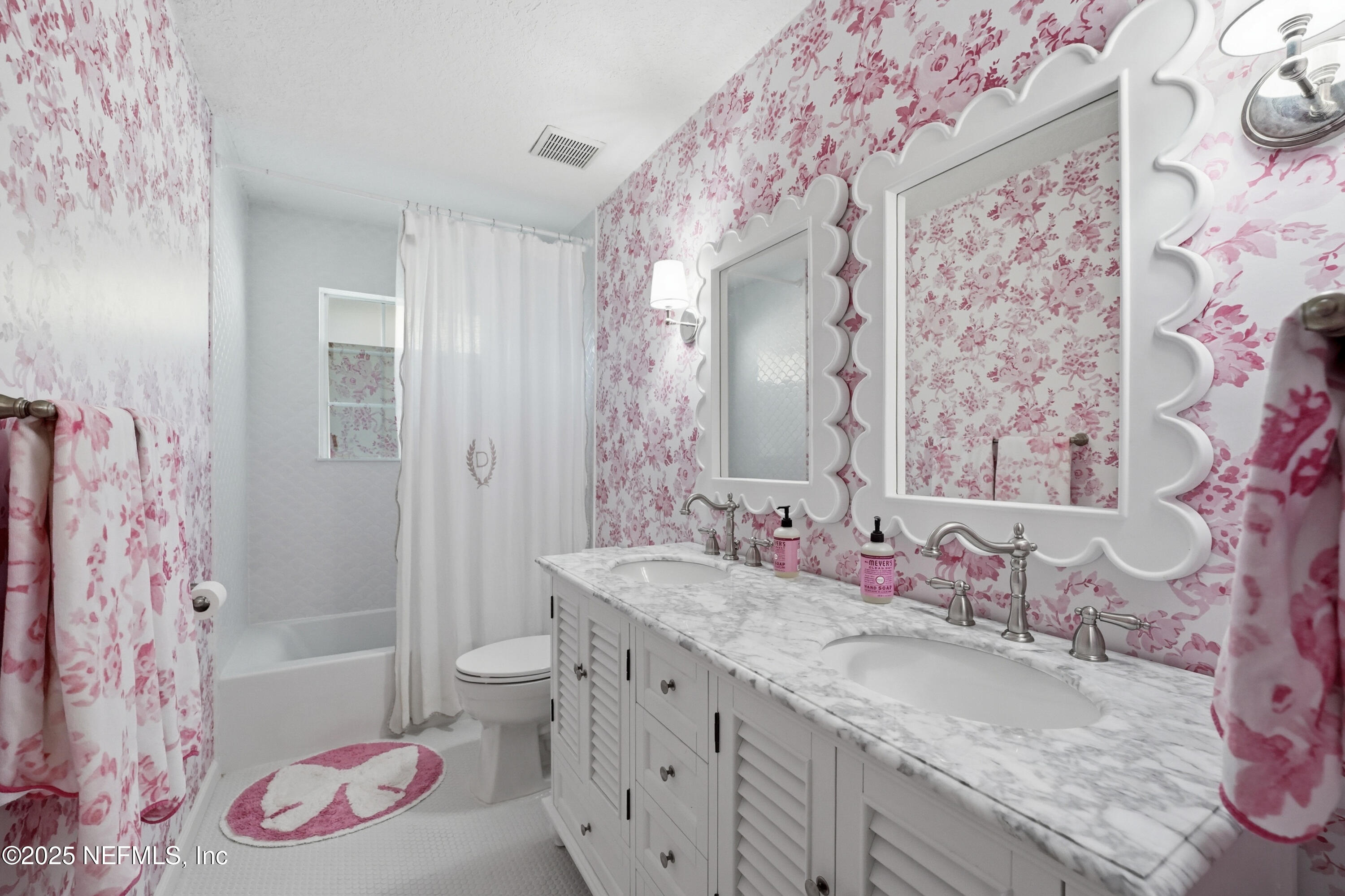 1202 Salt Creek Pointe Way Ponte Vedra Beach, FL 32082 - Photo 31 of 77 a bathroom with a granite countertop sink and a mirror