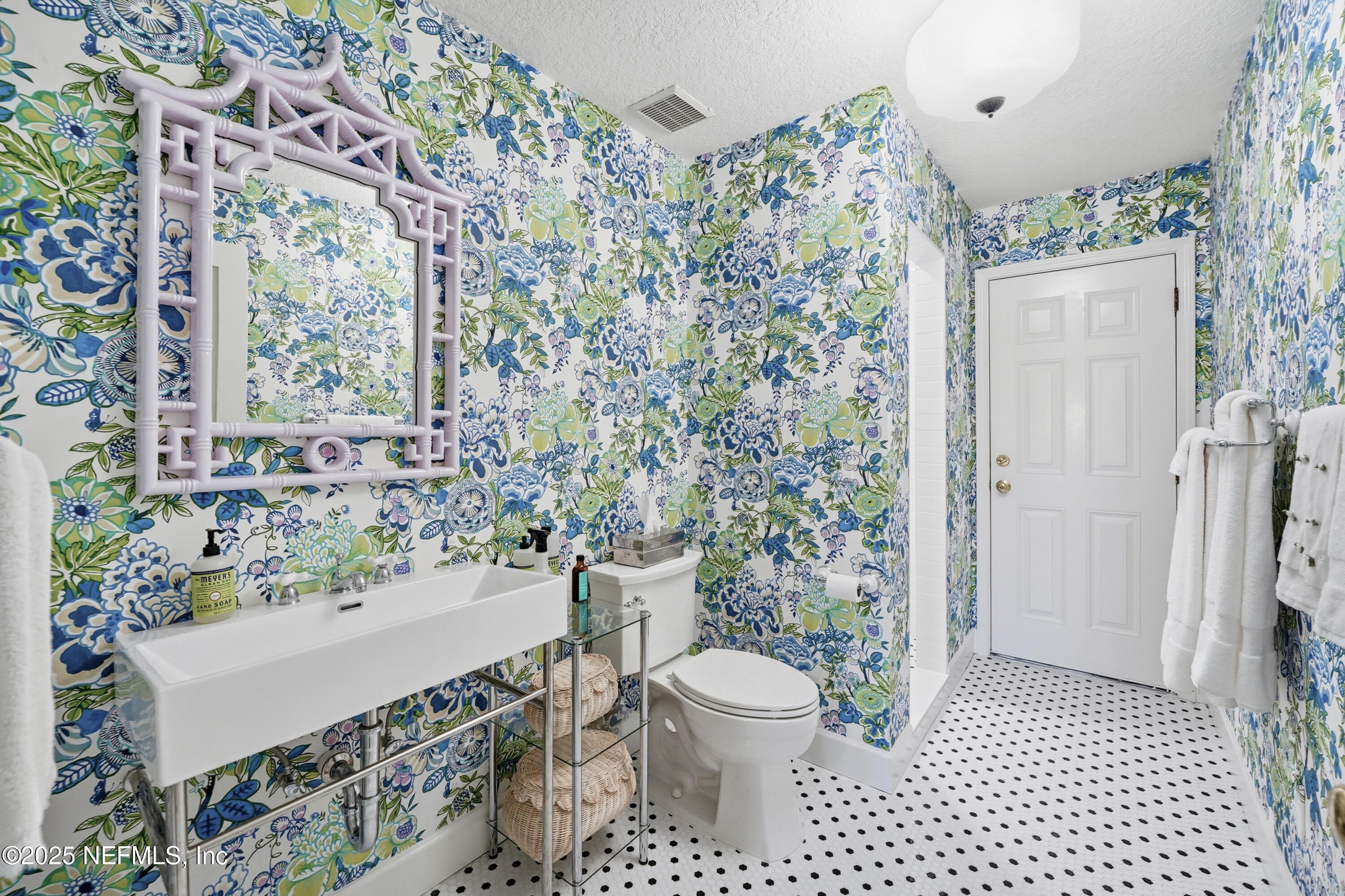 1202 Salt Creek Pointe Way Ponte Vedra Beach, FL 32082 - Photo 33 of 77 a bathroom with a toilet and a shower