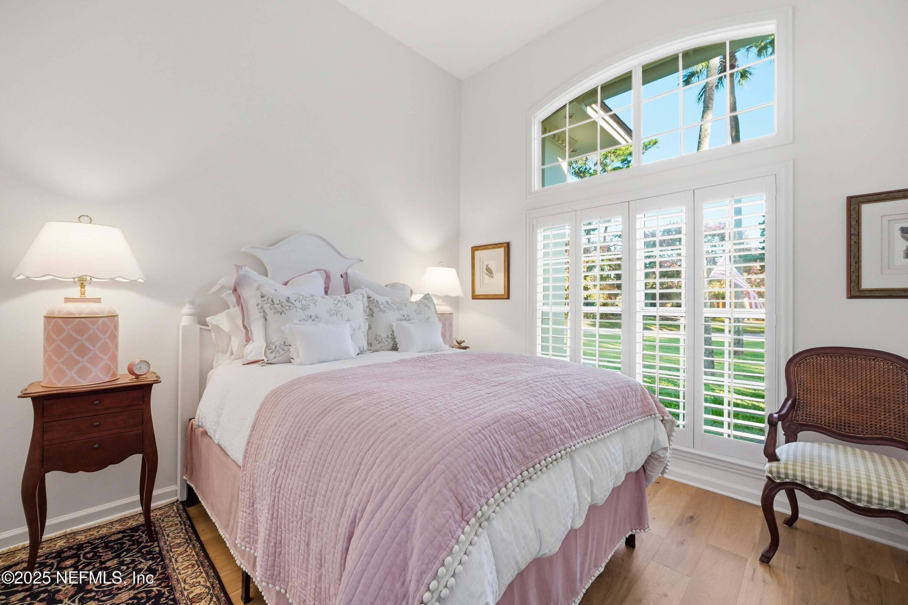 1202 Salt Creek Pointe Way Ponte Vedra Beach, FL 32082 - Photo 35 of 77 a bedroom with a bed and a chair