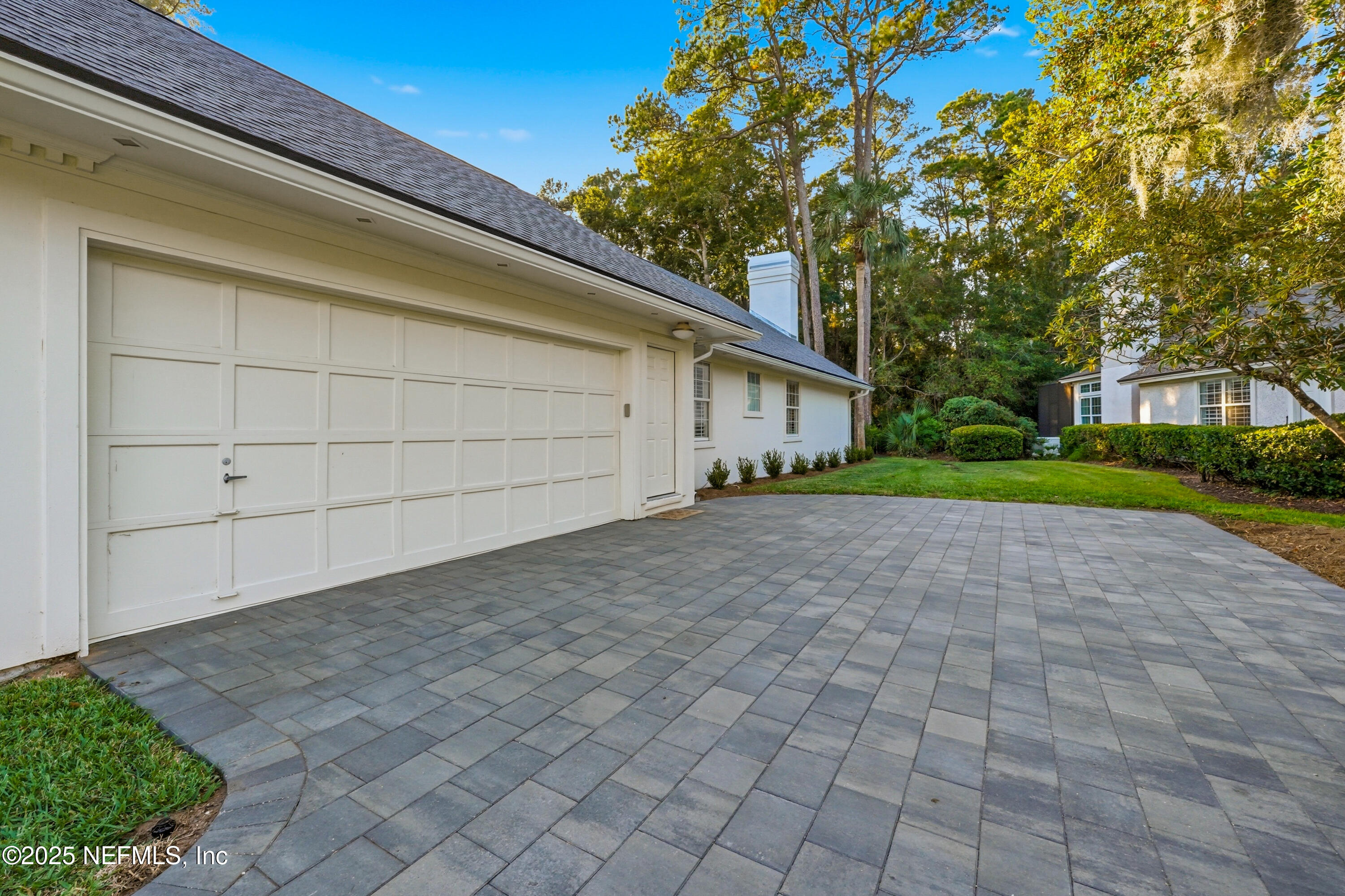 1202 Salt Creek Pointe Way Ponte Vedra Beach, FL 32082 - Photo 49 of 77 a view of backyard of house and trees