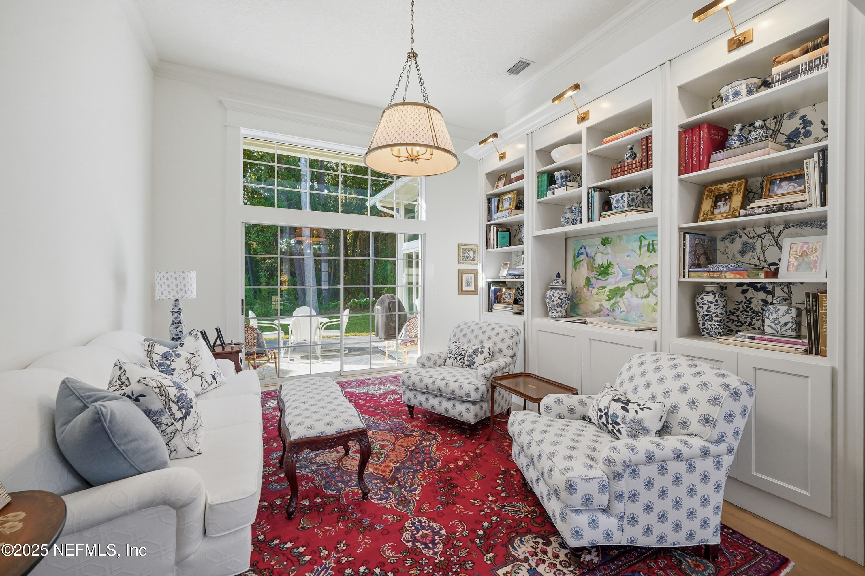1202 Salt Creek Pointe Way Ponte Vedra Beach, FL 32082 - Photo 5 of 77 a living room with furniture and a large window
