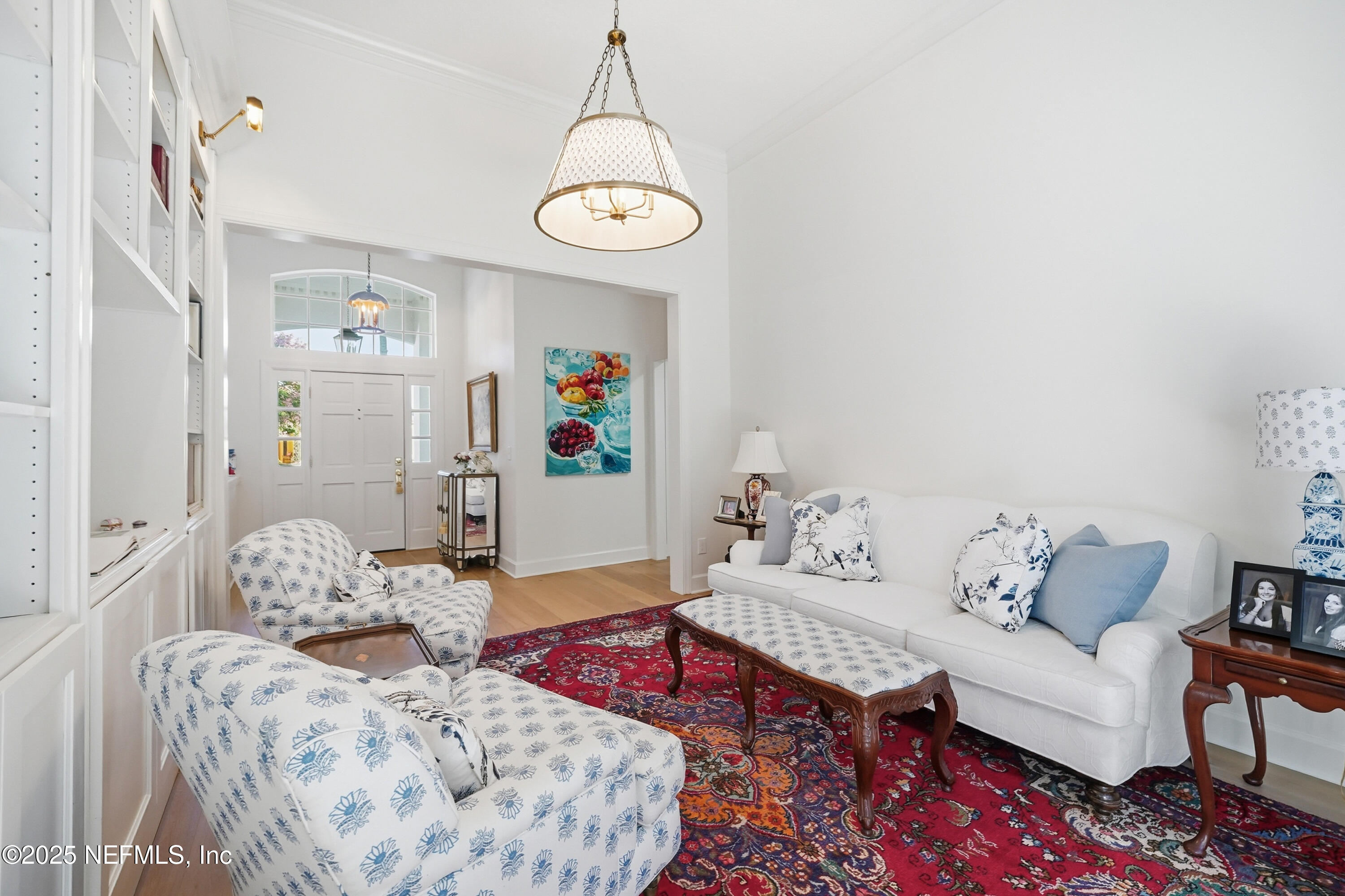 1202 Salt Creek Pointe Way Ponte Vedra Beach, FL 32082 - Photo 6 of 77 a living room with furniture and a table