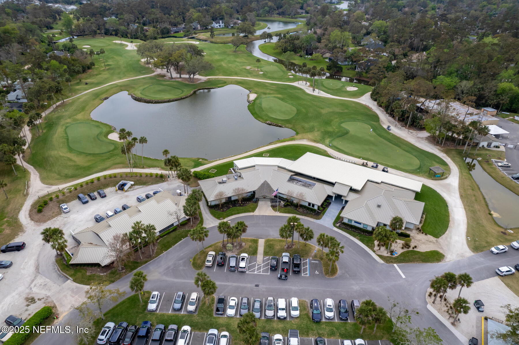 1202 Salt Creek Pointe Way Ponte Vedra Beach, FL 32082 - Photo 71 of 77 an aerial view of residential house with outdoor space and lake view