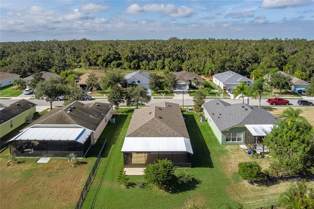 9822 50th St Circle East Parrish, FL 34219 - Photo 31 of 46 an aerial view of a house with a garden