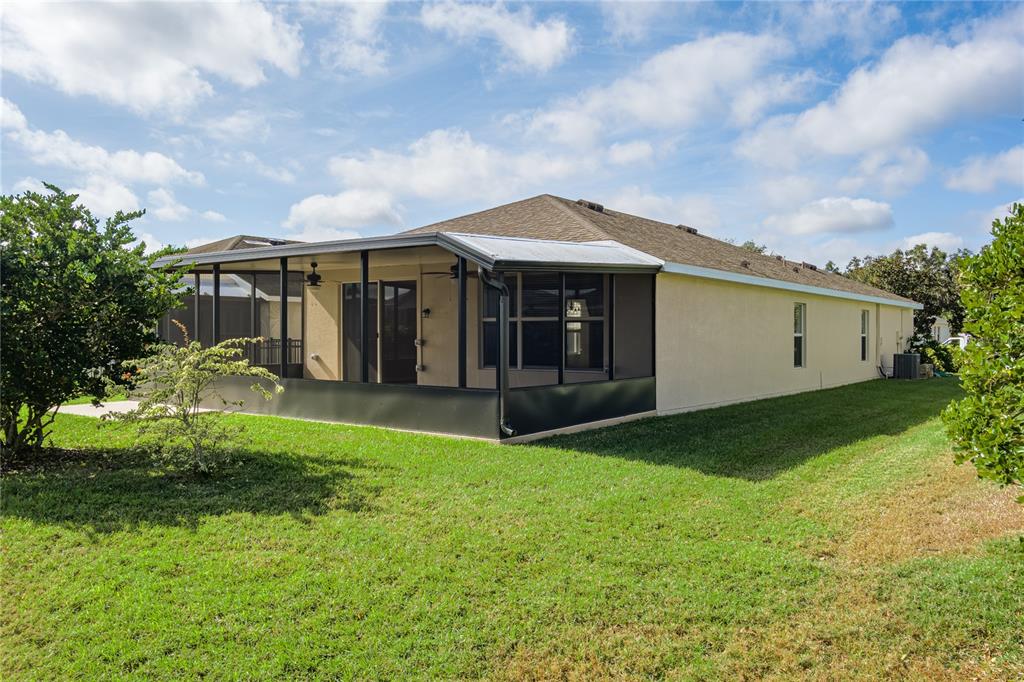 9822 50th St Circle East Parrish, FL 34219 - Photo 38 of 46 a view of a house with backyard and garden