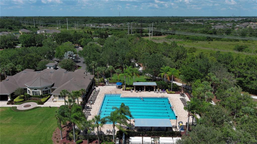 9822 50th St Circle East Parrish, FL 34219 - Photo 41 of 46 an aerial view of a house with garden space and street view
