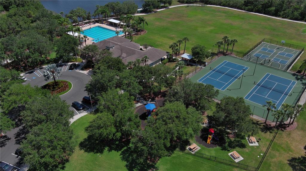 9822 50th St Circle East Parrish, FL 34219 - Photo 43 of 46 an aerial view of a house with garden space and street view