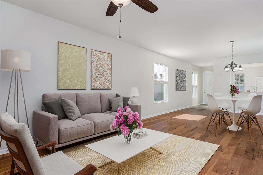 9822 50th St Circle East Parrish, FL 34219 - Photo 9 of 46 a living room with furniture and wooden floor