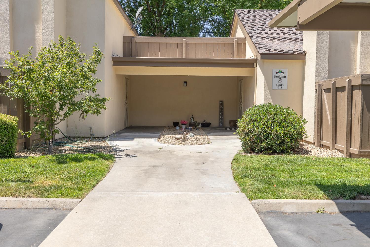 3700 Tully Road, Unit 5 Modesto, CA 95356 - Photo 2 of 38 a view of a house with a yard
