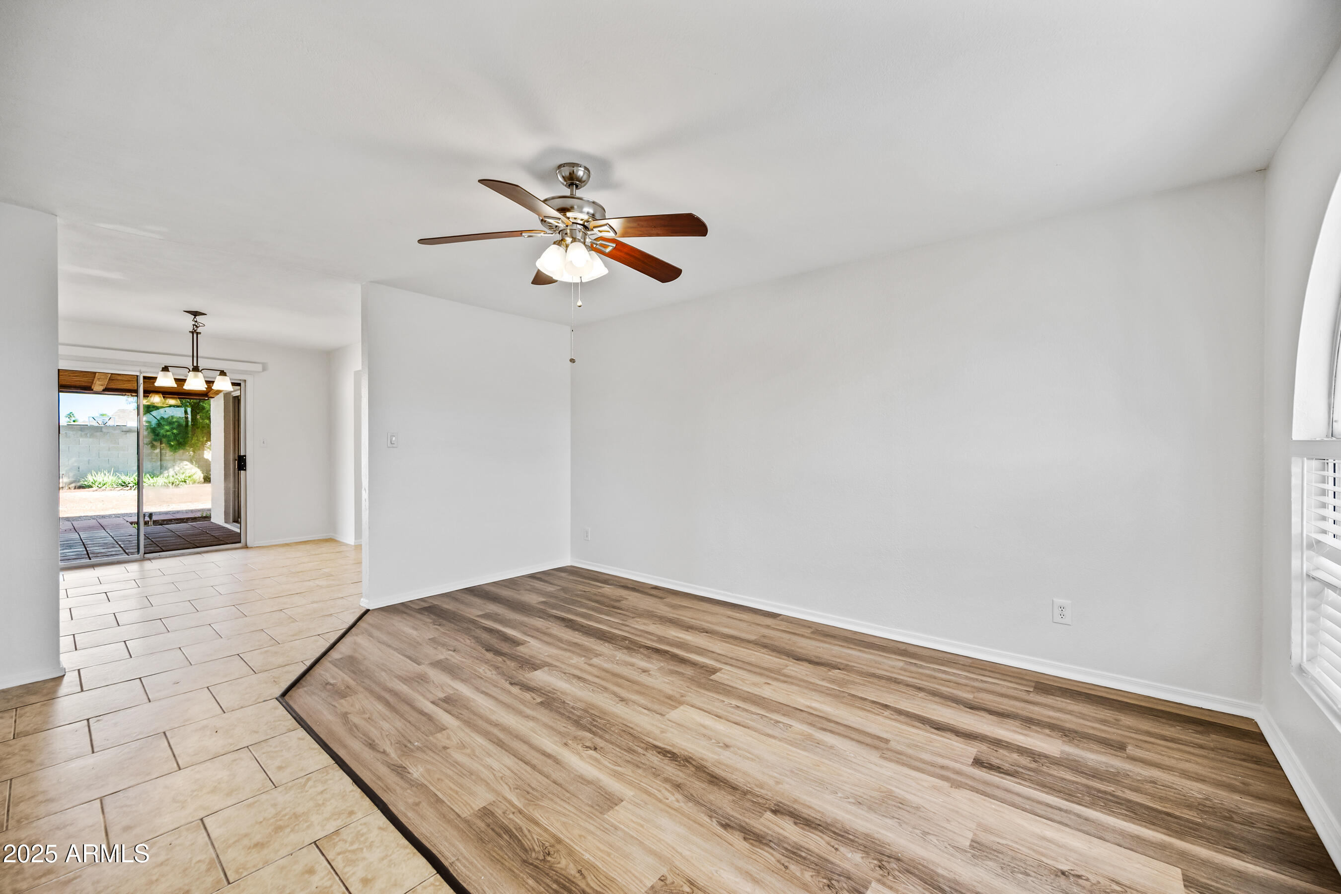 2211 North Bullmoose Drive Chandler, AZ 85224 - Photo 2 of 23 a view of empty room with wooden floor