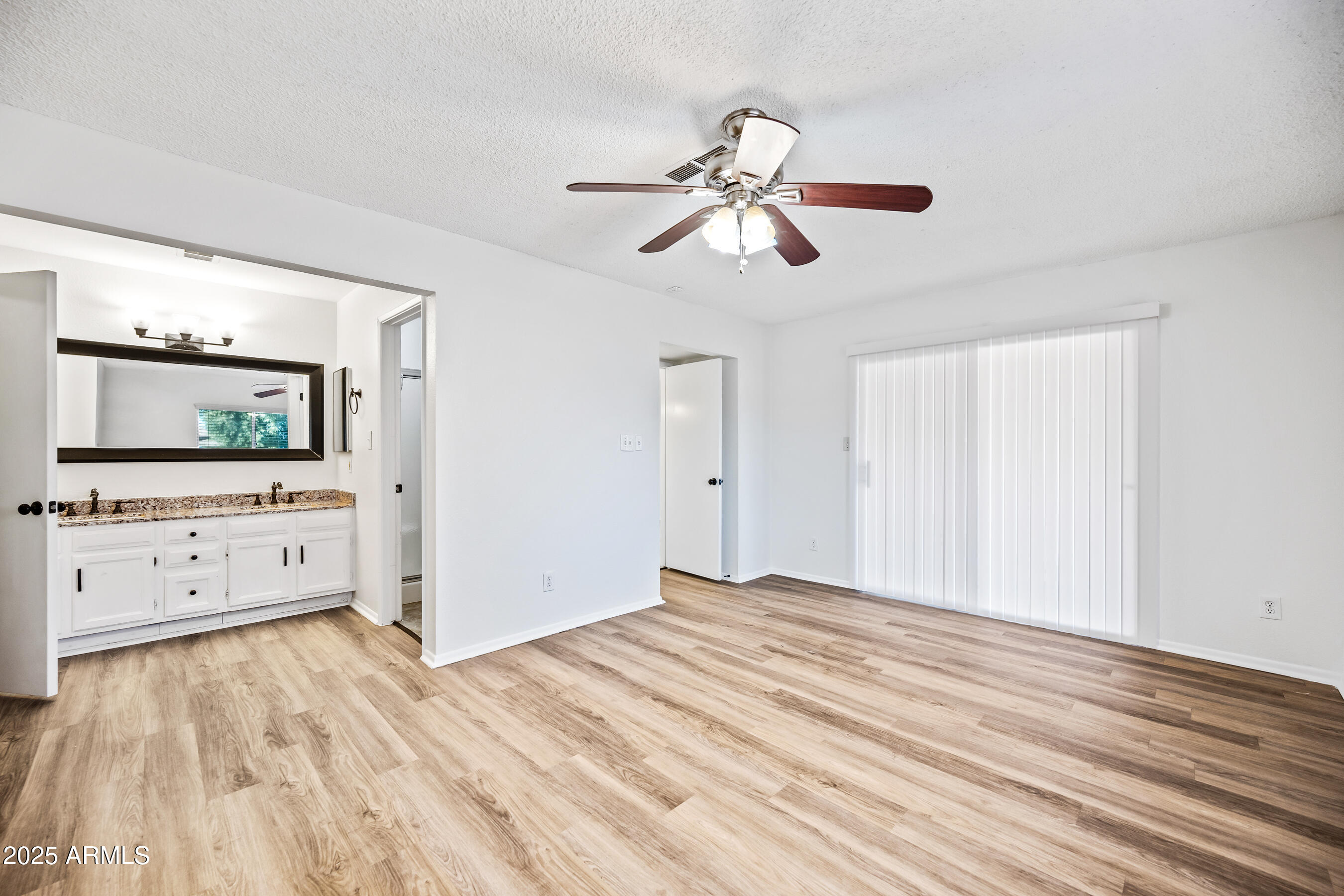 2211 North Bullmoose Drive Chandler, AZ 85224 - Photo 10 of 23 a view of a room with cabinet and flat screen tv