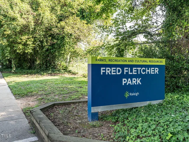 a sign on the side of the road