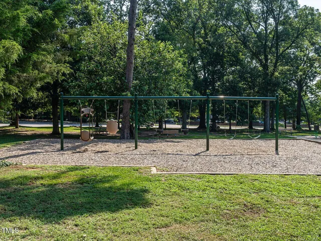 a view of park with swings