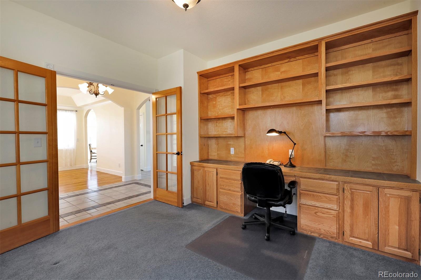 4627 Bayou Hills Road Parker, CO 80134 - Photo 13 of 40 a workspace with furniture and a window