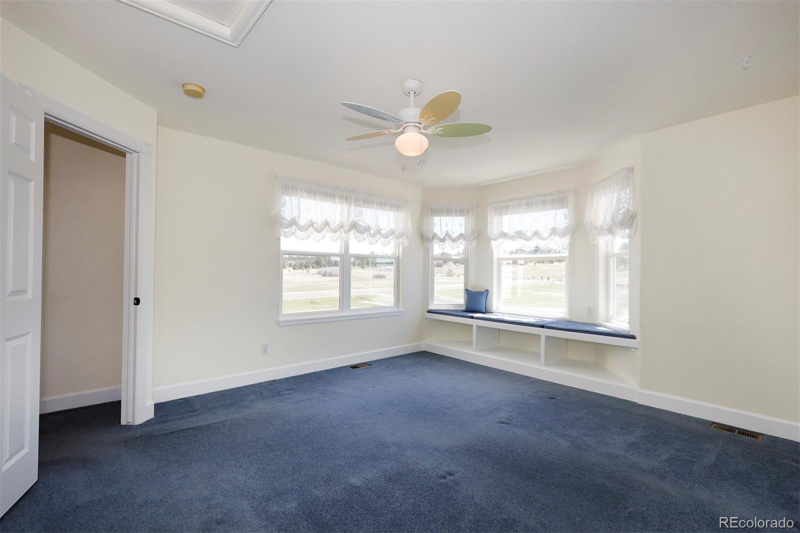 4627 Bayou Hills Road Parker, CO 80134 - Photo 22 of 40 a view of an empty room with a window