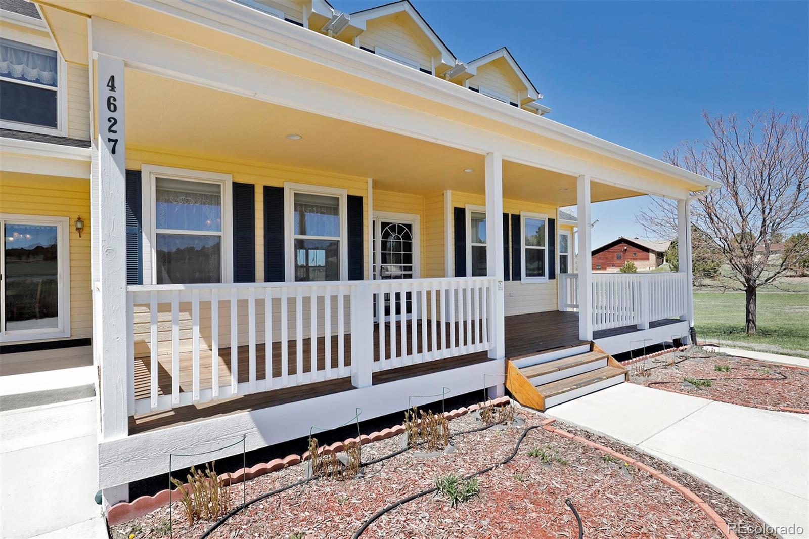 4627 Bayou Hills Road Parker, CO 80134 - Photo 3 of 40 a view of a house with wooden fence