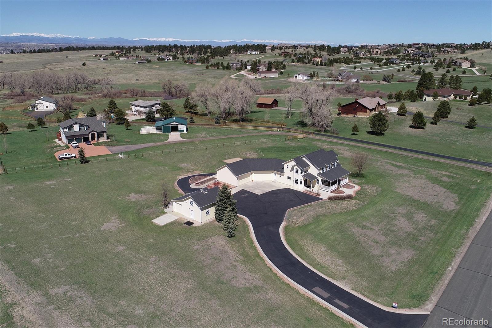 4627 Bayou Hills Road Parker, CO 80134 - Photo 39 of 40 an aerial view of a house with outdoor space