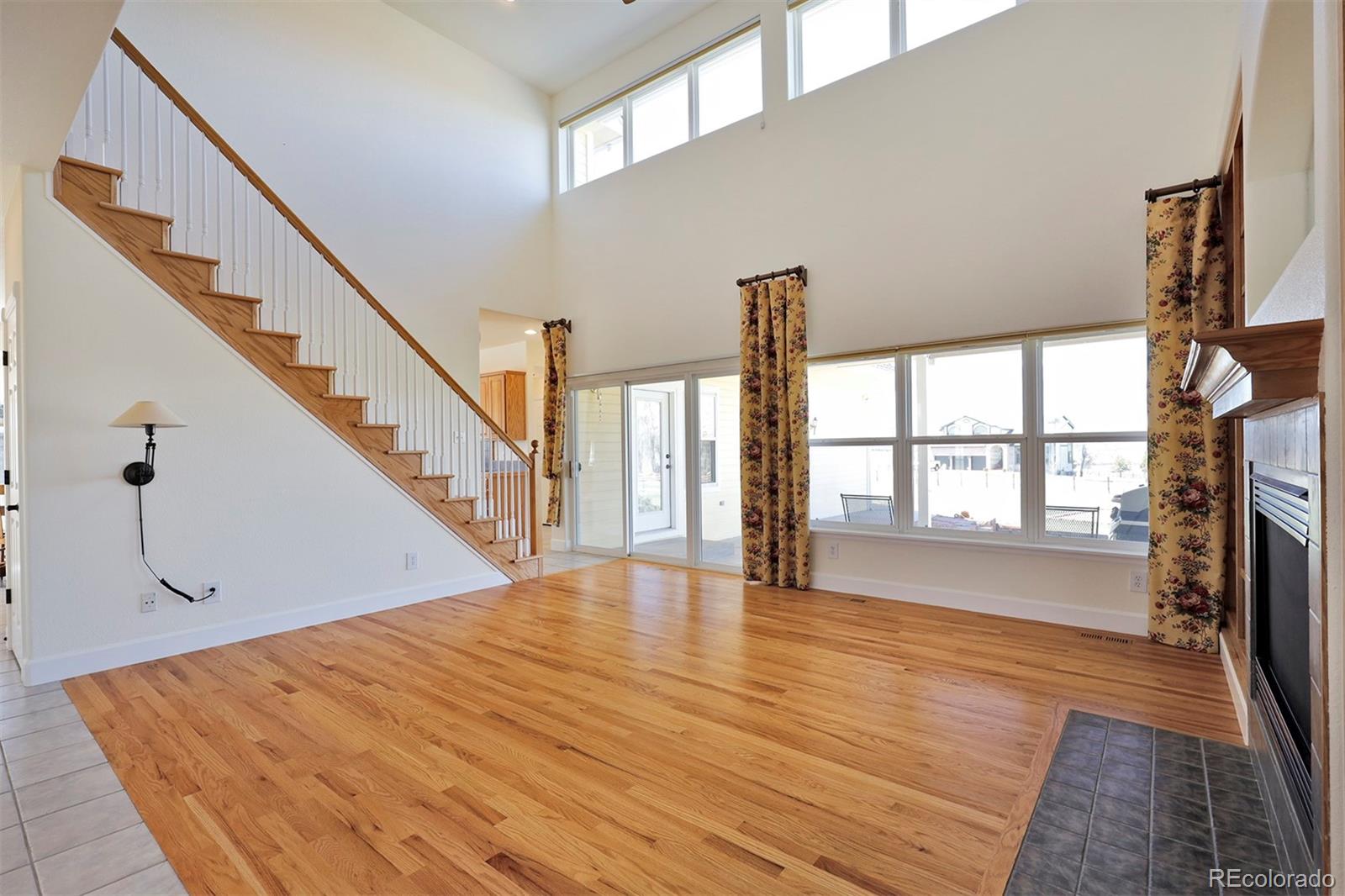 4627 Bayou Hills Road Parker, CO 80134 - Photo 6 of 40 a view of an entryway with wooden floor