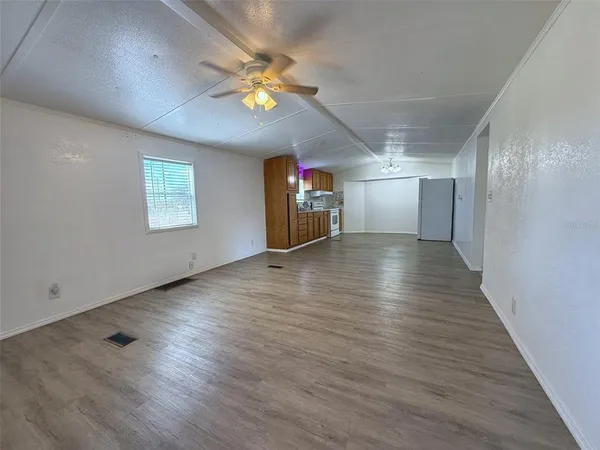 a view of a hallway with a large window