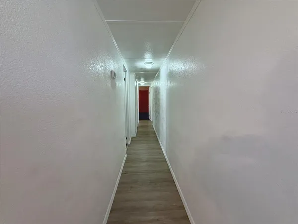a bathroom with a double vanity sink toilet mirror and shower