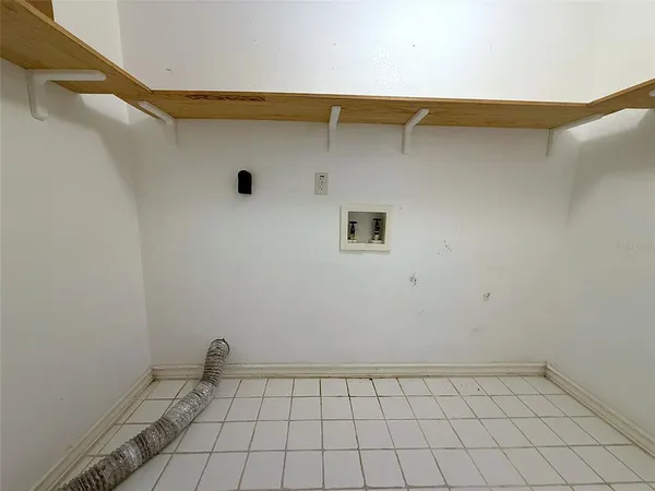 a backyard of a house with a yard and garage