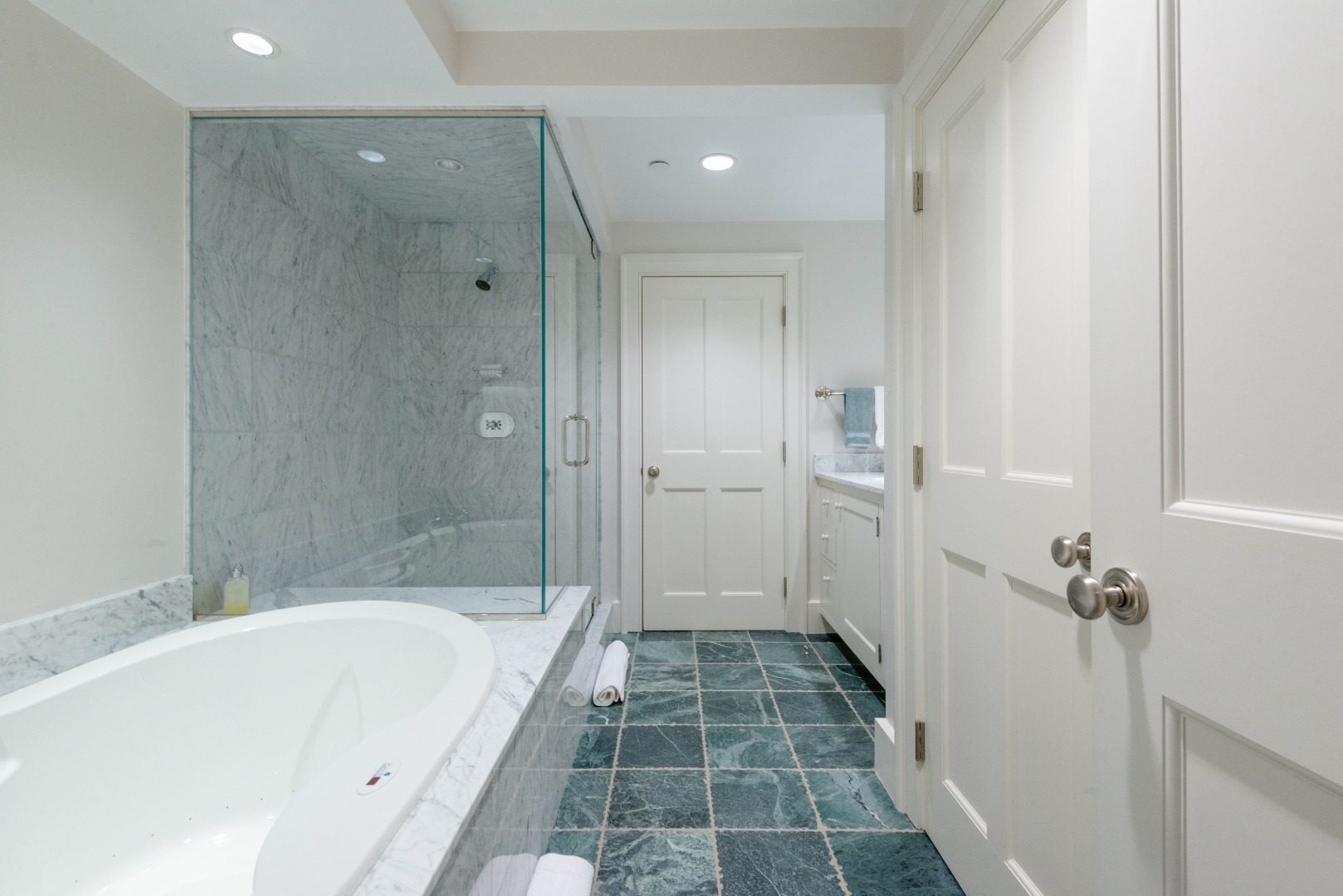 183 Polpis Road Nantucket, MA 02554 - Photo 46 of 62 a bathroom with a bathtub and a shower