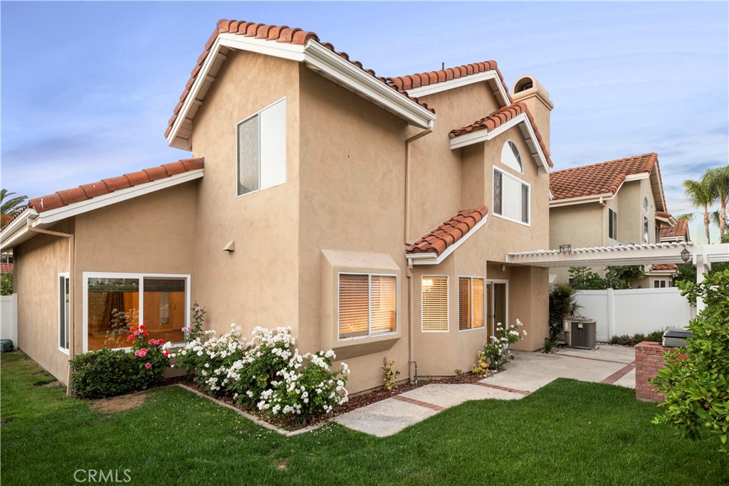 12 Rapallo Irvine, CA 92614 - Photo 18 of 21 front view of a house with a yard