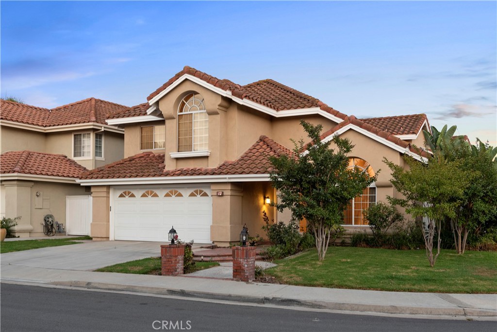 12 Rapallo Irvine, CA 92614 - Photo 21 of 21 a front view of a house with garden