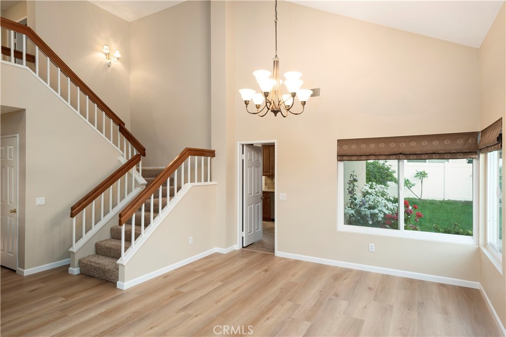12 Rapallo Irvine, CA 92614 - Photo 4 of 21 a view of an entryway with wooden floor