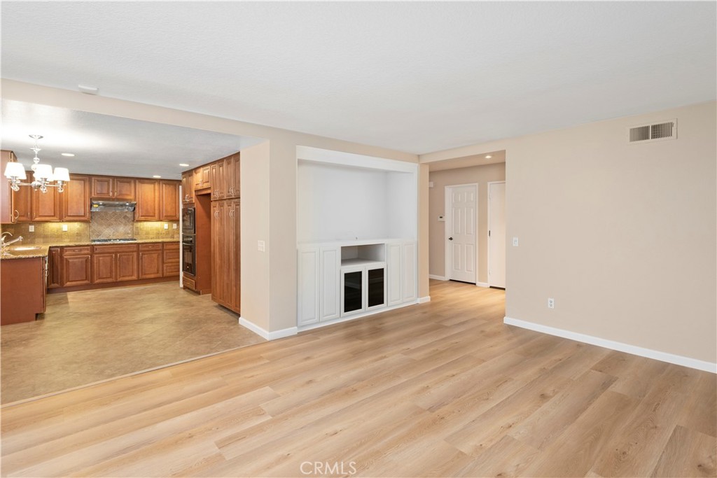 12 Rapallo Irvine, CA 92614 - Photo 7 of 21 a view of a kitchen with a sink and a refrigerator