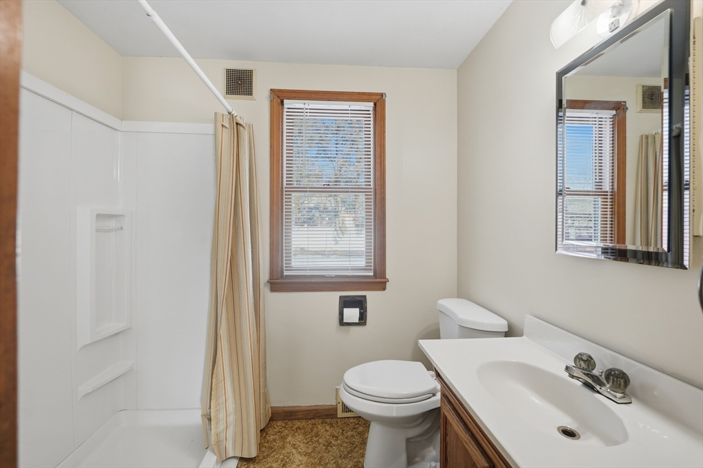 80 Jean Drive Springfield, MA 01104 - Photo 14 of 42 a bathroom with a sink and a toilet