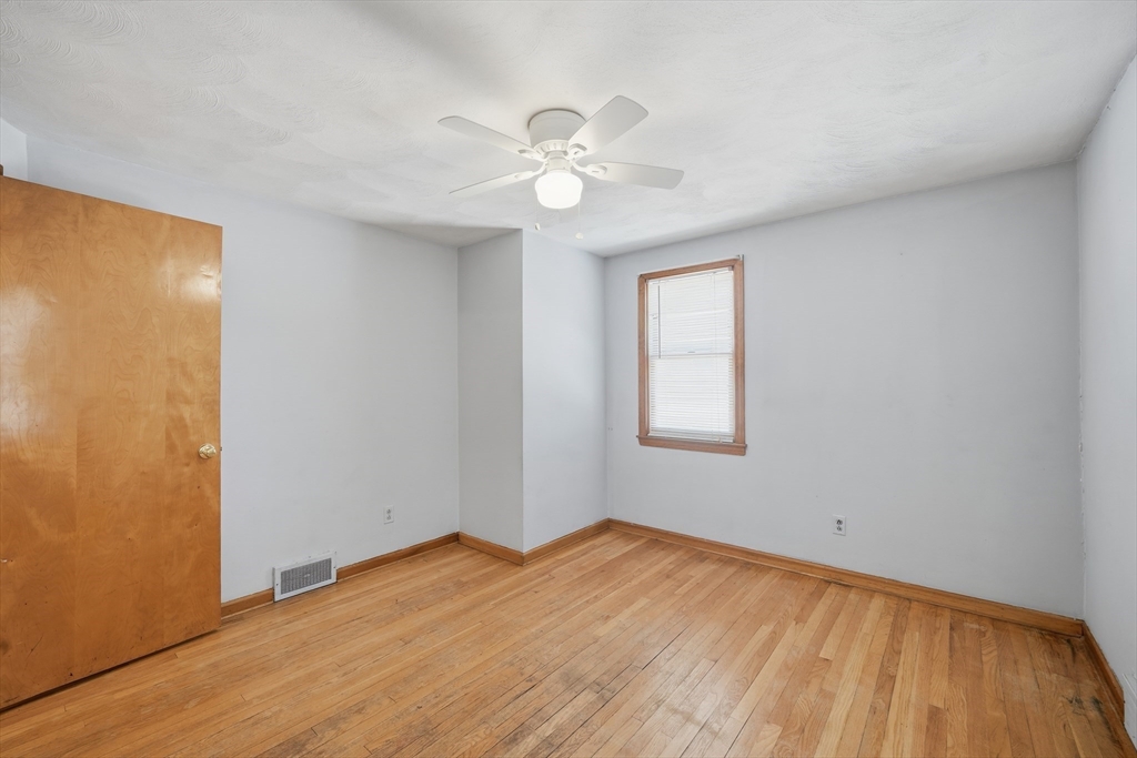 80 Jean Drive Springfield, MA 01104 - Photo 16 of 42 a view of empty room with wooden floor