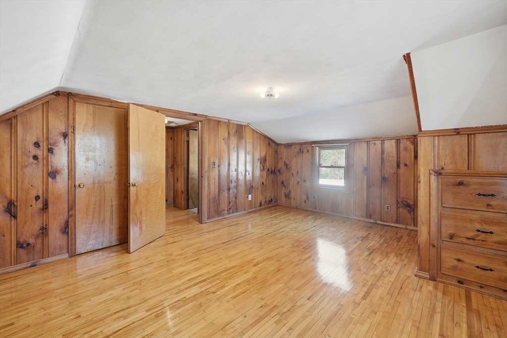 80 Jean Drive Springfield, MA 01104 - Photo 24 of 42 a view of an empty room with wooden floor and a window